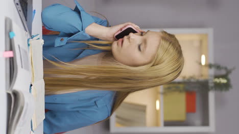 Vertical-video-of-Female-student-receiving-bad-news-on-the-phone.